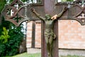 Ancient Crucifix with the autumn leaf Royalty Free Stock Photo