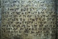 Ancient cuneiform writing script on the wall Royalty Free Stock Photo