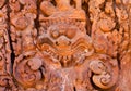 Ancient daemon carving on the wall Royalty Free Stock Photo