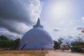 Ancient Dagoba of the Ruwanwelisaya Stupa on a sunny day. Anuradhapura, Sri Lanka