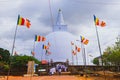 Ancient Dagoba of the Ruwanwelisaya Stupa on a sunny day. Anuradhapura, Sri Lanka