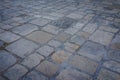 Ancient dark granite stone floor pattern as background in Italy