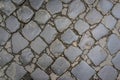 Ancient dark granite stone floor pattern as background in Rome,