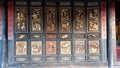 An ancient decorated door in the typical Chinese noble residence of the Zhu`s Family, Jianshui, Yunnan, China