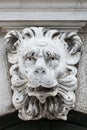 Ancient decoration element of scary lion head at roof of Basilica San Marco and Doge Palace in Venice, Italy