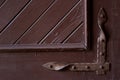 Ancient decorative metallic element on wooden door