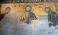 Ancient Deesis Mosaic of Jesus Christ flanked by the Virgin Mary and John the Baptist in the Hagia Sophia cathedral Royalty Free Stock Photo