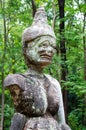Ancient demon statue in Wat Umong ,Thailand. Royalty Free Stock Photo