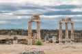 The ancient destroyed city of Hierapolis near Pamukkale, Denizli, Turkey in the summer. On a background the sky in overcast. Horiz