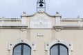 Ancient detail facade building port, sign house for sale of fish