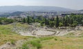 Ancient Dionysus theater under the ruins of Acropolis, with view over the city of Athens, Greece, in summer sunny day Royalty Free Stock Photo