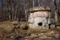 Ancient dolmen in Zhane river gorge on sunny day. Gelendzhik, Krasnodar Krai, Russia Royalty Free Stock Photo