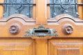 Ancient door handle on the door to the house