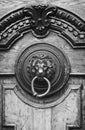 An ancient door handle with metal lion head in Tbilisi, Georgia Royalty Free Stock Photo