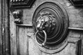 An ancient door handle with metal lion head in Tbilisi, Georgia Royalty Free Stock Photo