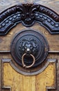 An ancient door handle with metal lion head in Tbilisi, Georgia Royalty Free Stock Photo