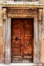 Ancient wood door of a historic building in Perugia (Tuscany, Italy) Royalty Free Stock Photo