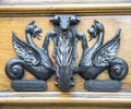 Ancient door knocker on a wooden door. Royalty Free Stock Photo