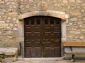 Ancient door of rampant dark wood arch