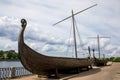 Ancient Drakkar - Viking wooden boat on the waterfront in Vyborg, Russia