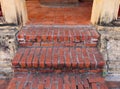 Ancient earthenware brick stair and floor entering to an old Buddhist chapel in a temple