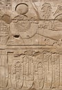 Ancient Egyptian art of hieroglyphs carving on stone Royalty Free Stock Photo