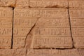 Ancient Egyptian hieroglyphs carved on the stone. The roof of Karnak temple. Royalty Free Stock Photo