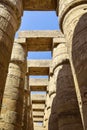 Ancient Egyptian hieroglyphs and symbols carved on columns of the complex of the Karnak temple. Great Hypostyle Hall Royalty Free Stock Photo
