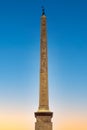 Ancient Egyptian obelisk at St. Peter square, Piazza San Pietro, in front of St. Peter Basilica in Vatican city of Rome in Italy Royalty Free Stock Photo