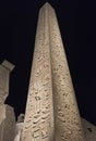 Ancient egyptian obelisk in temple at night Royalty Free Stock Photo