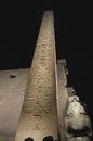 Ancient egyptian obelisk in temple at night Royalty Free Stock Photo