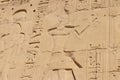 Ancient egyptian paintings and hieroglyphs on wall in Karnak Temple Complex in Luxor, Egypt Royalty Free Stock Photo