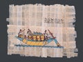 Ancient egyptian papyrus with boat and hieroglyphs