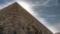 The ancient Egyptian pyramid of Cheops against the blue sky Royalty Free Stock Photo