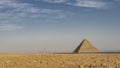 The ancient Egyptian pyramid of Mykerin on the background of the blue sky. Royalty Free Stock Photo