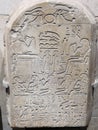 Ancient Egyptian script hieroglyphs feasting carved stone Royalty Free Stock Photo