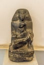 Ancient Egyptian statuette of mother and child