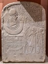 Ancient Egyptian tablet depicting offering to Horus in relief and incised carving in Kingston Lacy Country House, near Wimborne Mi