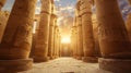 Ancient Egyptian temple hallway at sunset, luxury columns of old stone building in Egypt. Theme of pharaoh, civilization, travel, Royalty Free Stock Photo