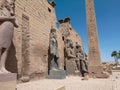 Ancient egyptian temple with an obelisk full of hieroglyphics and statues Royalty Free Stock Photo