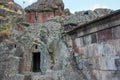 Ancient engraved crosses on the cave church wall and rock-cut tomb in the Medieval Geghard Monastery,Armenia. Royalty Free Stock Photo