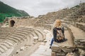 Ancient Ephesus: a girl in the ruins of an amphitheater