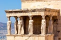 Ancient Erechtheion or Erechtheum temple with Caryatid Porch on the Acropolis, Athens, Greece. World famous landmark at the Royalty Free Stock Photo