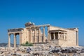 Ancient Erechtheion or Erechtheum temple with Caryatid Porch on the Acropolis, Athens, Greece. World famous landmark at the Royalty Free Stock Photo