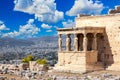 Ancient Erechtheion or Erechtheum temple with Caryatid Porch on the Acropolis, Athens, Greece. World famous landmark at the Royalty Free Stock Photo