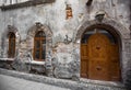 Ancient facade of the house, old doors and windows.