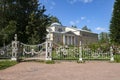 Ancient fence of the Rose Pavilion in Pavlovsky park on a sunny July day. Surroundings of St. Petersburg