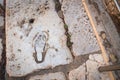 Ancient footprint, female figure and heart shape on the marble ground. Ephesus Ancient City