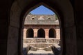 Ancient fort ruined city at Mandu, Madhya Pradesh, India. Arched architecture in the palace Jahaz Mahal Royalty Free Stock Photo