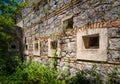 Ancient fortification wall with windows